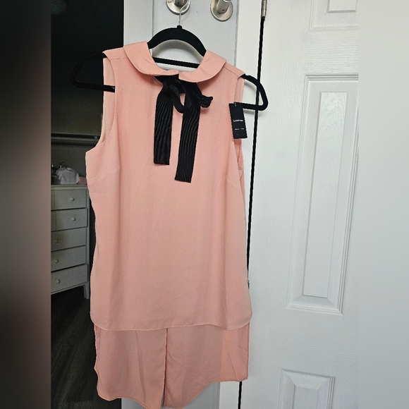 Bebe Blouse tunic with tags Size S pink/salmon color very chic bows and flowy - Picture 3 of 9